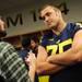 Michigan offensive linesman Michael Schofield answers questions in the locker room during media day at Michigan Stadium on Sunday, August 11, 2013. Melanie Maxwell | AnnArbor.com